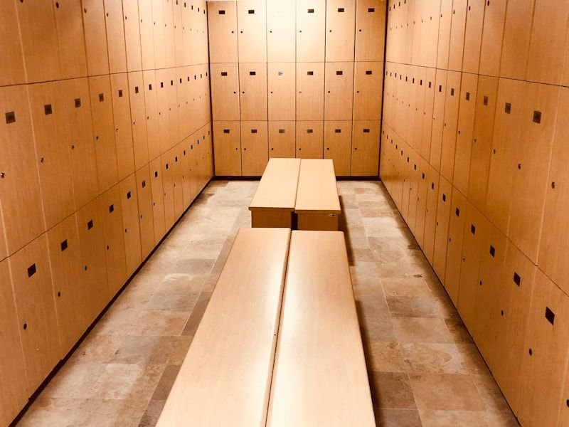 Changing area with timber lockers and bench seating