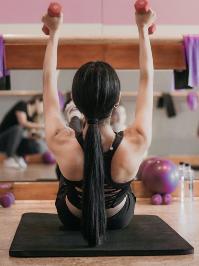 Member Priya during a mobility and stretching session