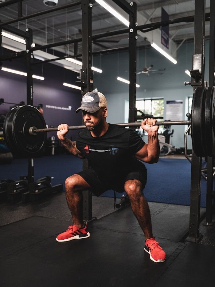 Member Tom working through a squat set